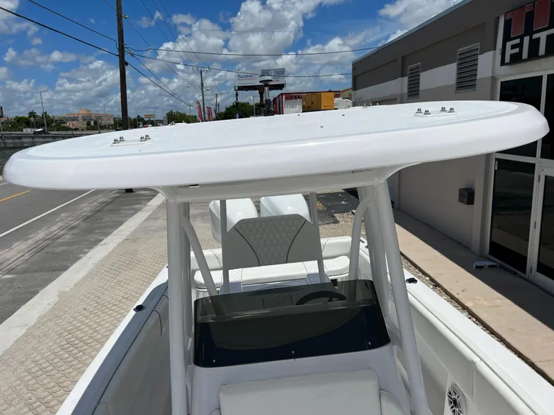 Slide: The Image of 1979 Wellcraft Scarab Sport 302 boat parked on a sunny day. - 26
