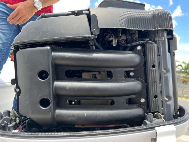 Slide: The Image of Close-up of the engine of a 1979 Wellcraft Scarab Sport 302 boat. - 32