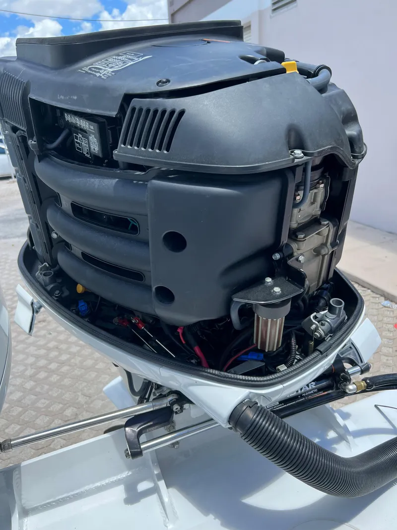 Slide: The Image of Close-up of a Wellcraft Scarab Sport 302 outboard motor, 1979 model. - 34