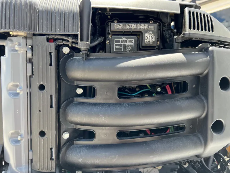 Slide: The Image of Close-up of the engine of a 1979 Wellcraft Scarab Sport 302 boat. - 35