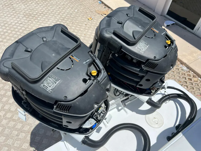 Slide: The Image of Twin engines of a 1979 Wellcraft Scarab Sport 302 boat. - 37