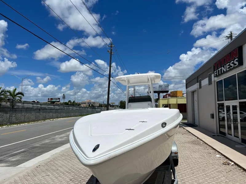 Slide: The Image of 1979 Wellcraft Scarab Sport 302 boat parked on a sunny day. - 9