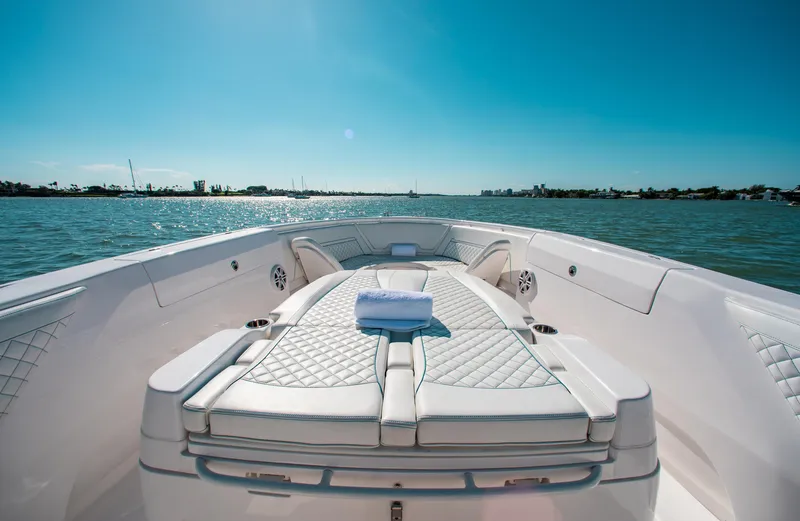 Slide: The Image of Luxurious 2021 Intrepid 407 Nomad FE boat with plush seating on a sunny day. - 13