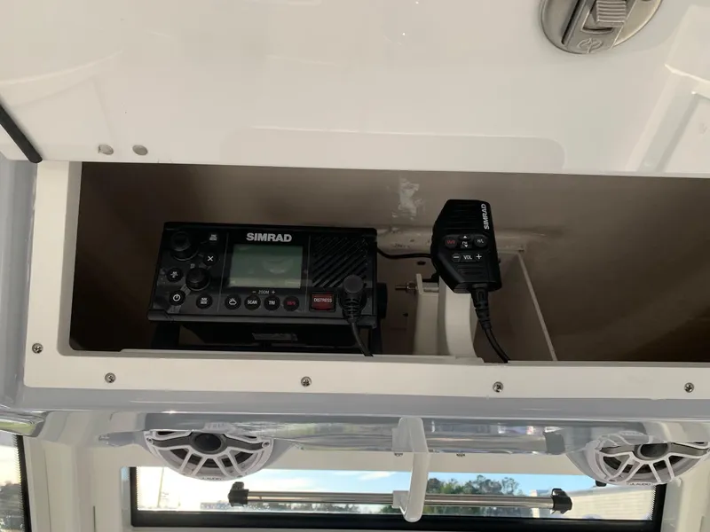 Slide: The Image of Simrad marine radio system in 2024 Robalo R360 boat. - 14