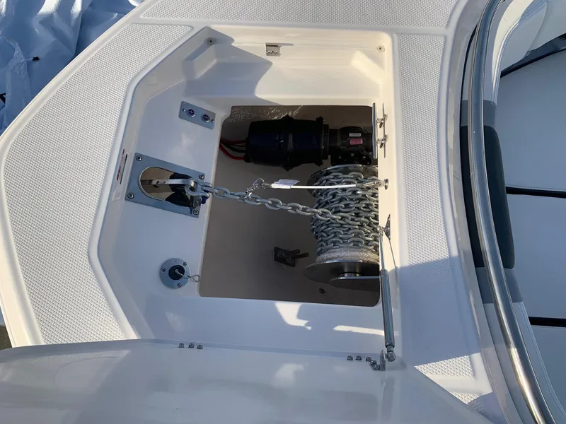 Slide: The Image of Anchor storage compartment of 2024 Robalo R360 boat. - 29
