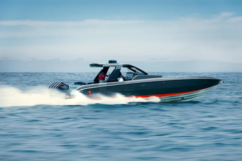 Slide: The Image of 2025 Cigarette 41 Nighthawk speedboat cruising on open water. - 12