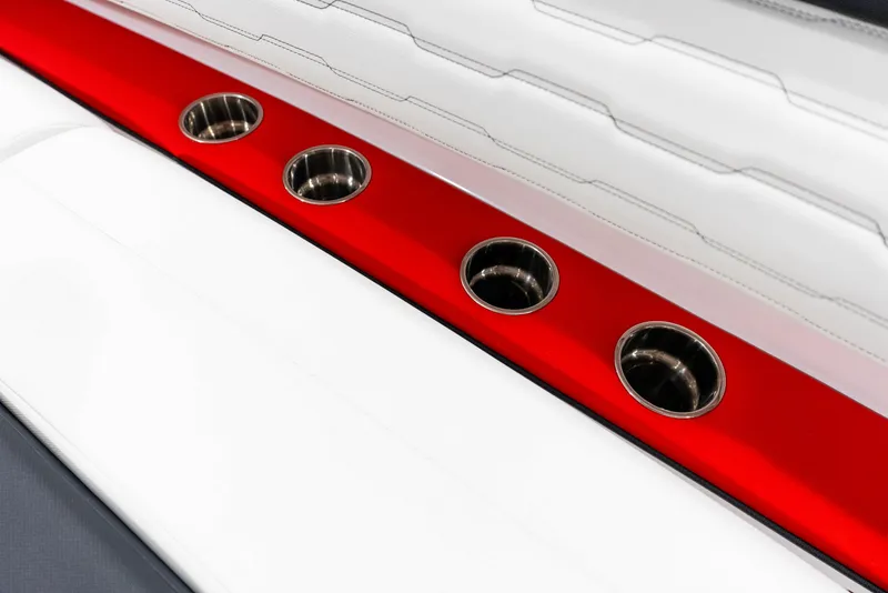 Slide: The Image of Close-up of 2025 Cigarette 41 Nighthawk boat's red and white interior with cup holders. - 17