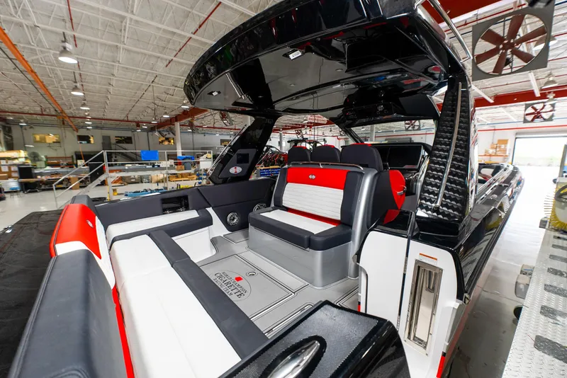 Slide: The Image of 2025 Cigarette 41 Nighthawk luxury boat interior in a warehouse. - 26