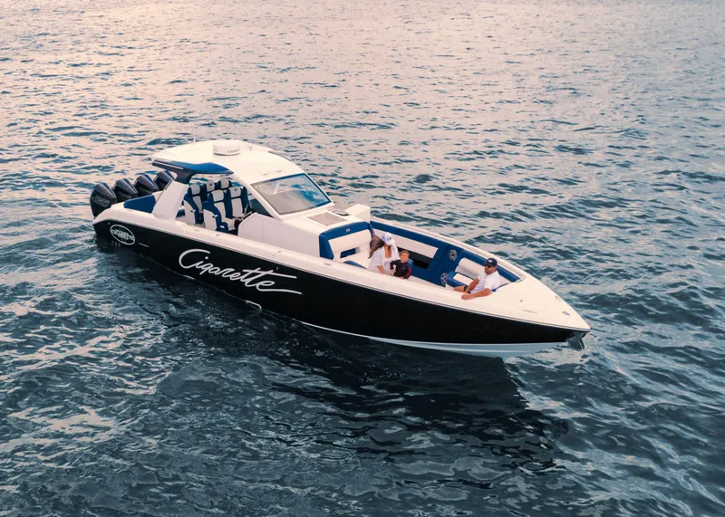 Slide: The Image of 2025 Cigarette 41 Nighthawk boat cruising on open water. - 7