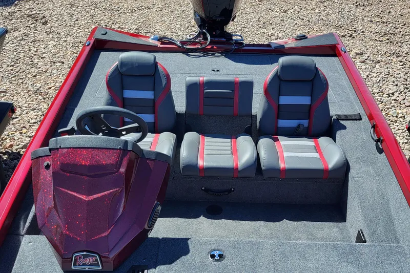 Slide: The Image of 2023 Ranger RT188 boat interior with red and gray seating. - 5