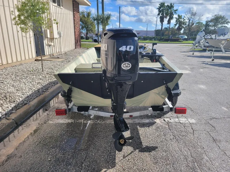 Slide: The Image of 2021 Hog Island Boat Works SW16 with 40 HP outboard motor on trailer. - 11