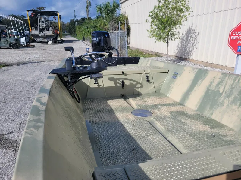 Slide: The Image of 2021 Hog Island Boat Works SW16, interior view, camo pattern, Suzuki outboard motor. - 3