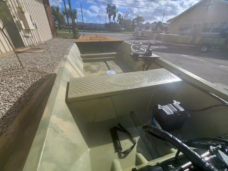 Slide: The Image of 2021 Hog Island Boat Works SW16, interior view, parked outdoors on a sunny day. - 7