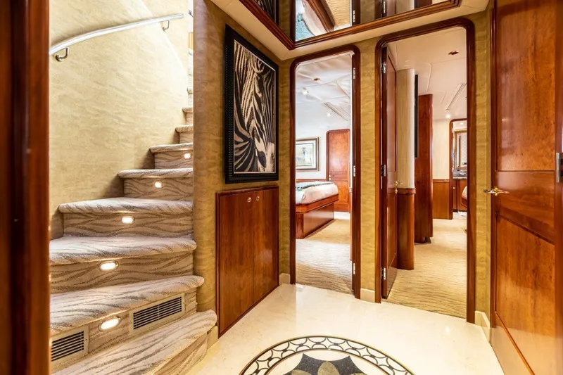 Slide: The Image of Luxurious bathroom on a 2002 Westport Flybridge yacht with dual showers and elegant decor. - 23