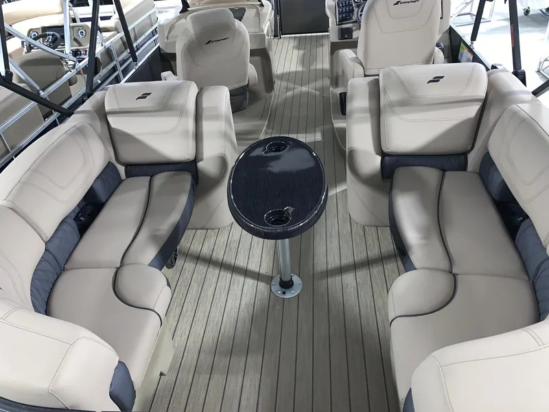 Slide: The Image of 2024 Starcraft SLS 3 DC boat interior with luxurious seating and central table. - 3