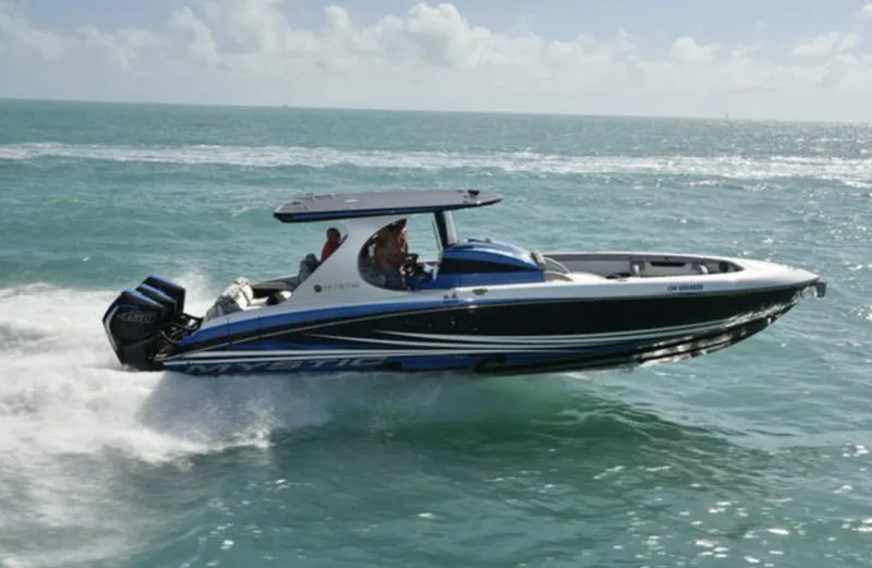 Slide: The Image of 2020 Mystic 3800 speedboat cruising on the ocean. - 1