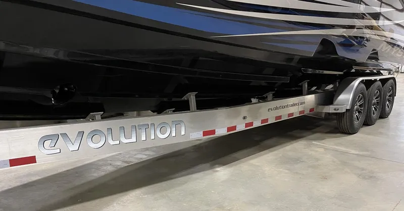 Slide: The Image of Alt text: 2020 Mystic 3800 boat on Evolution trailer in a garage. - 11