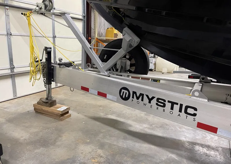Slide: The Image of Mystic 3800 powerboat trailer in a garage, 2020 model. - 12