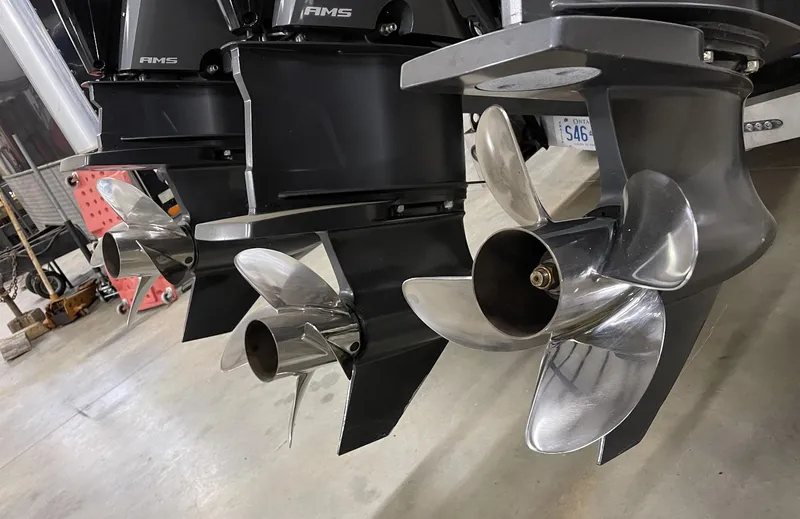 Slide: The Image of Close-up of Mystic 3800 2020 boat propellers in a garage. - 15