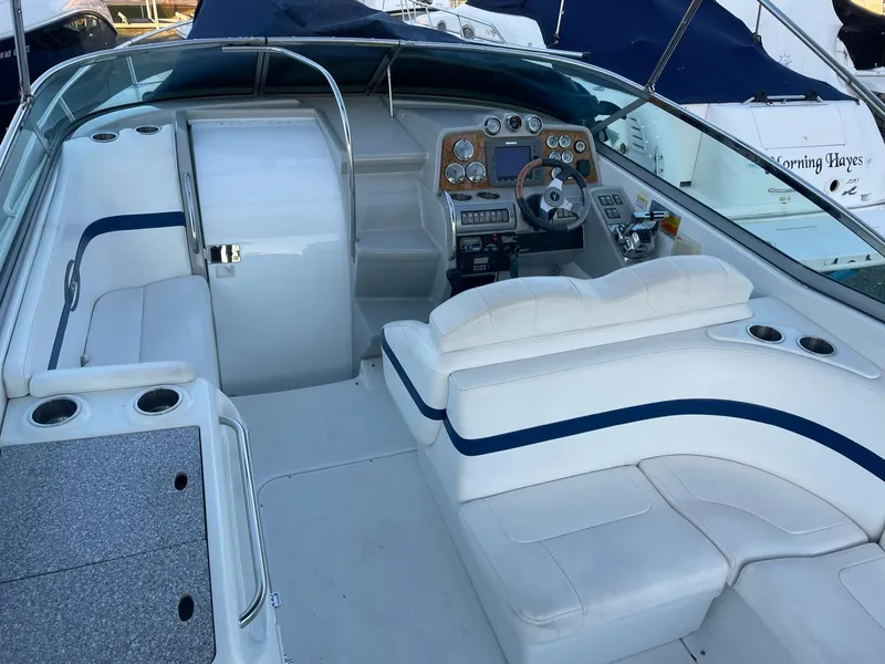 Slide: The Image of Interior of a 2007 Formula 310 Sun Sport boat with helm station. - 12