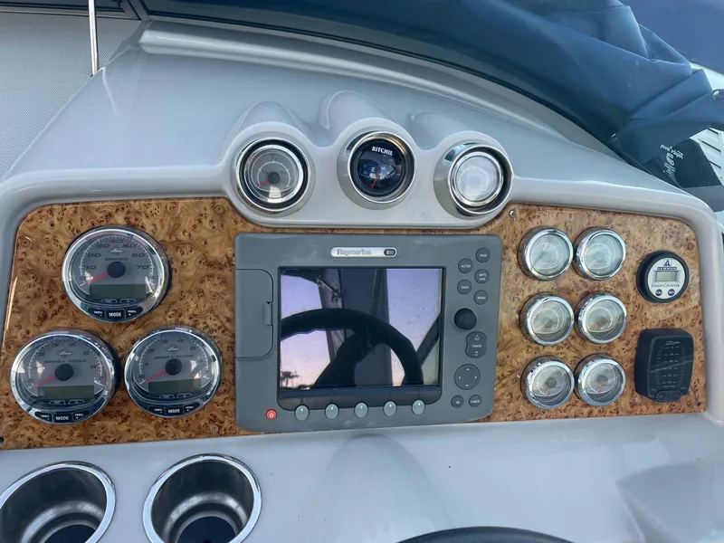 Slide: The Image of Dashboard of a 2007 Formula 310 Sun Sport boat with instruments. - 16