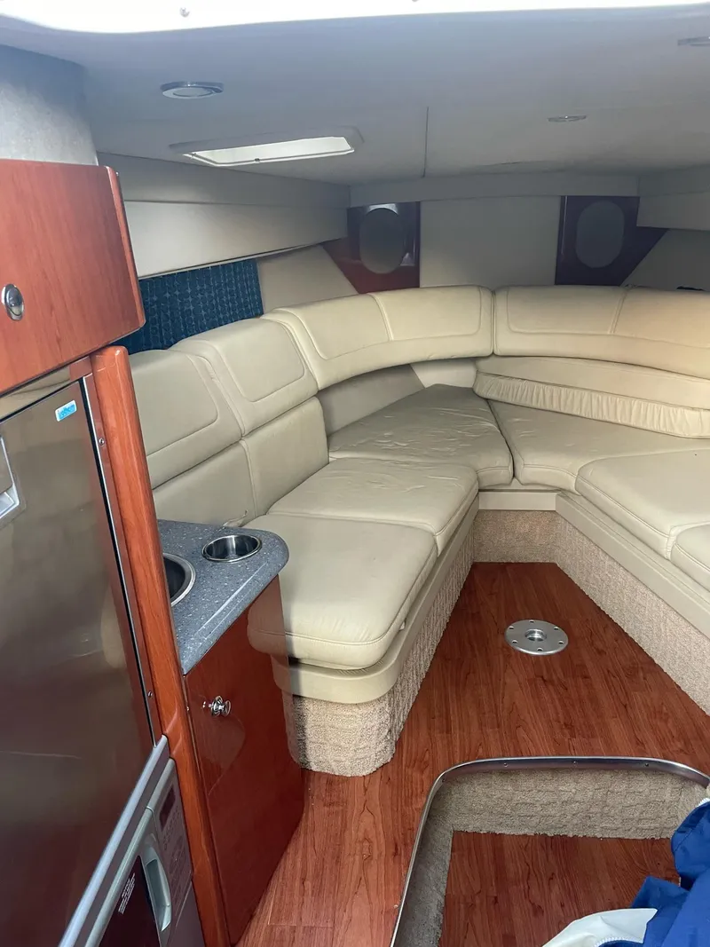 Slide: The Image of Interior of 2007 Formula 310 Sun Sport with leather seating and wood flooring. - 17