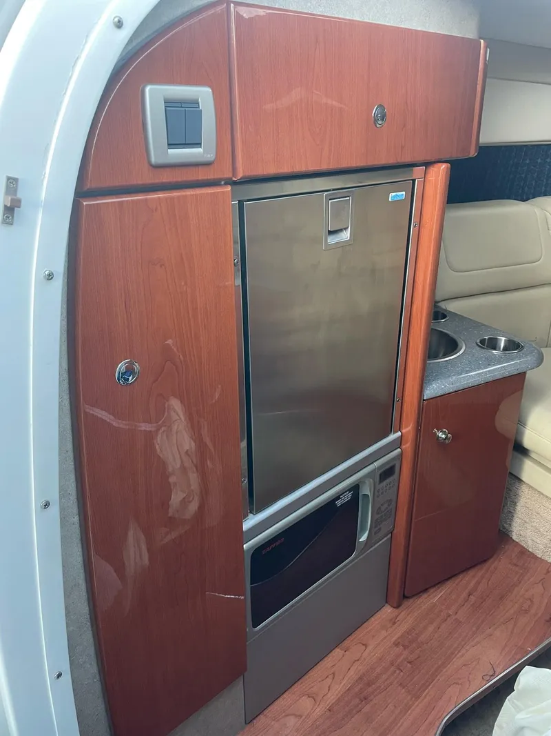 Slide: The Image of Interior of 2007 Formula 310 Sun Sport with wood cabinetry. - 18