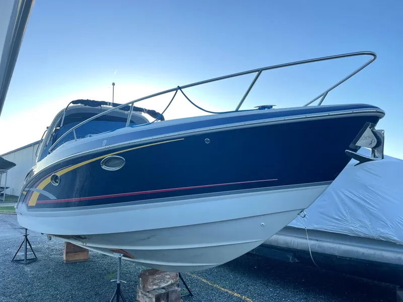 Slide: The Image of 2007 Formula 310 Sun Sport boat elevated outdoors. - 3