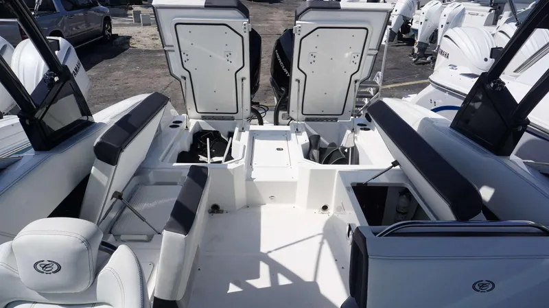 Slide: The Image of 2023 Cobalt R8 boat interior with open storage compartments and seating. - 15