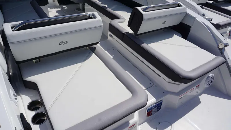 Slide: The Image of 2023 Cobalt R8 boat interior with sleek seating and cup holders. - 6