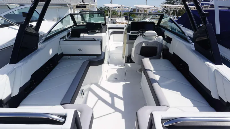 Slide: The Image of 2023 Cobalt R8 boat interior with luxurious seating and modern design. - 7