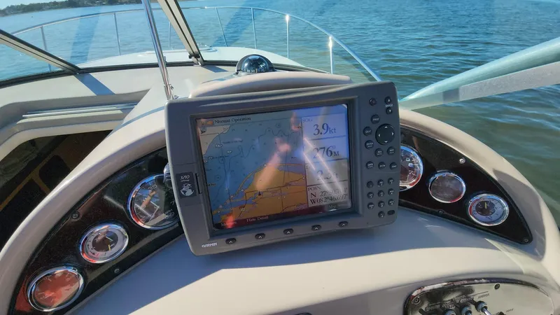 Slide: The Image of Dashboard of a 2006 Sea Ray 270 Amberjack with GPS navigation system. - 2