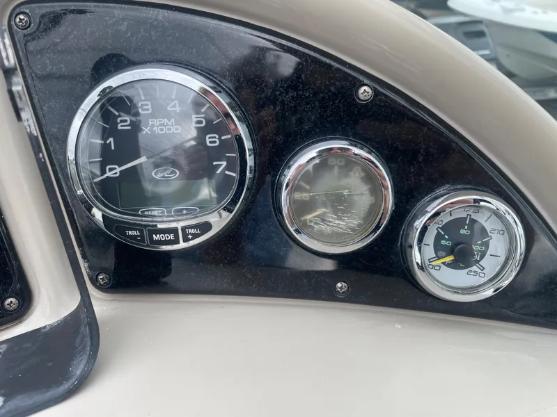 Slide: The Image of Dashboard gauges of a 2006 Sea Ray 270 Amberjack boat. - 26