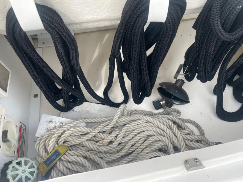 Slide: The Image of Ropes and equipment in 2006 Sea Ray 270 Amberjack storage compartment. - 42