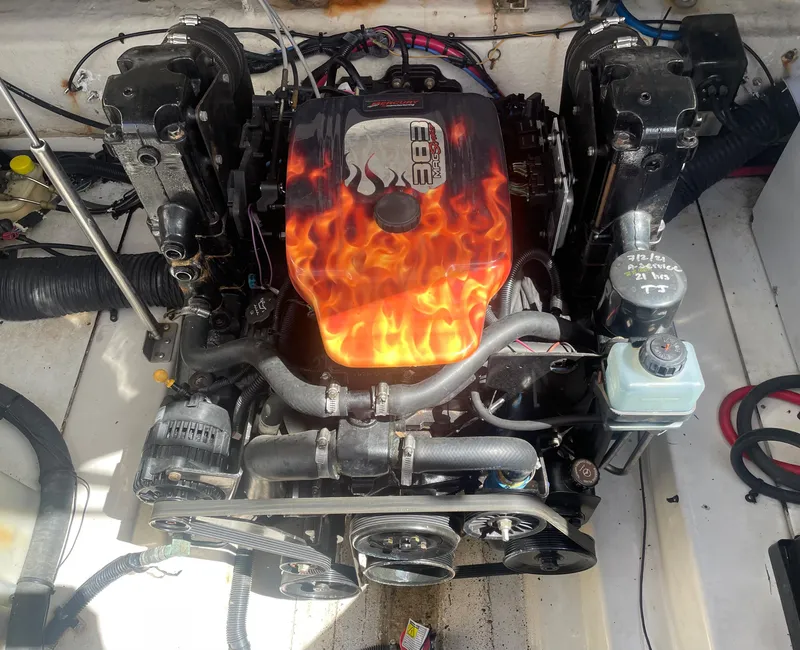 Slide: The Image of 2006 Sea Ray 270 Amberjack engine with custom flame design cover. - 46