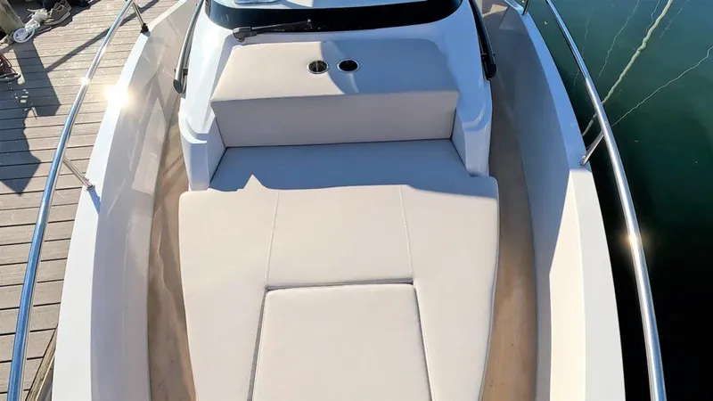 Slide: The Image of 2023 RYCK 280 boat with beige seating and sleek design. - 21