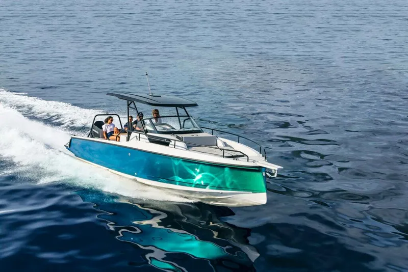 Slide: The Image of 2023 RYCK 280 boat cruising on open water. - 27