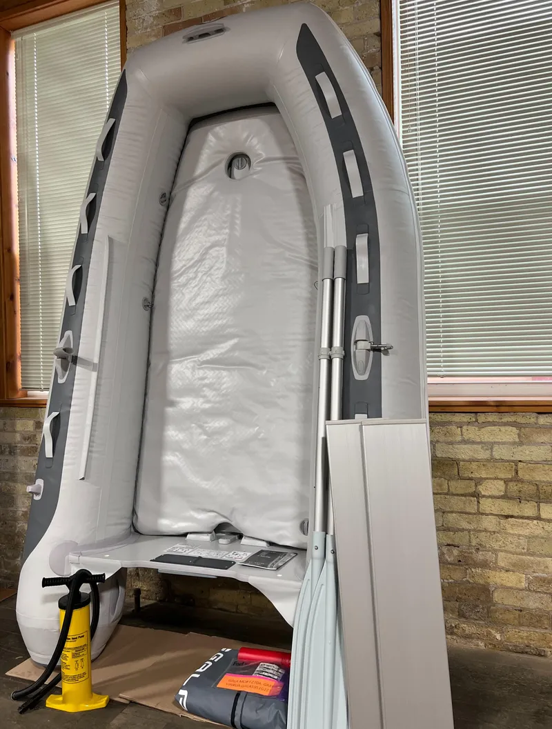 The Image of 2023 Gala F270A inflatable boat with accessories in storage. - 0