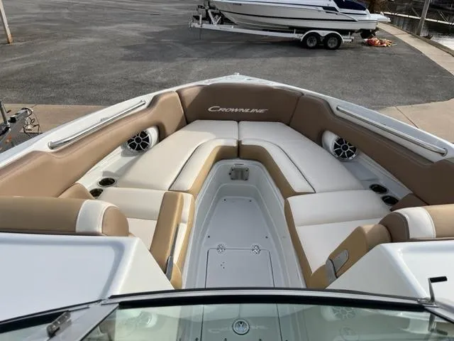 Slide: The Image of 2023 Crownline 290 SS boat with spacious seating and modern design. - 4