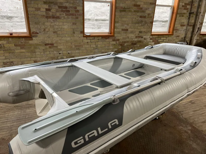 The Image of 2023 Gala A300D inflatable boat in a brick-walled room. - 0
