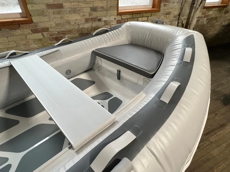 Slide: The Image of 2023 Gala A300D inflatable boat interior with seating and oar holders. - 3