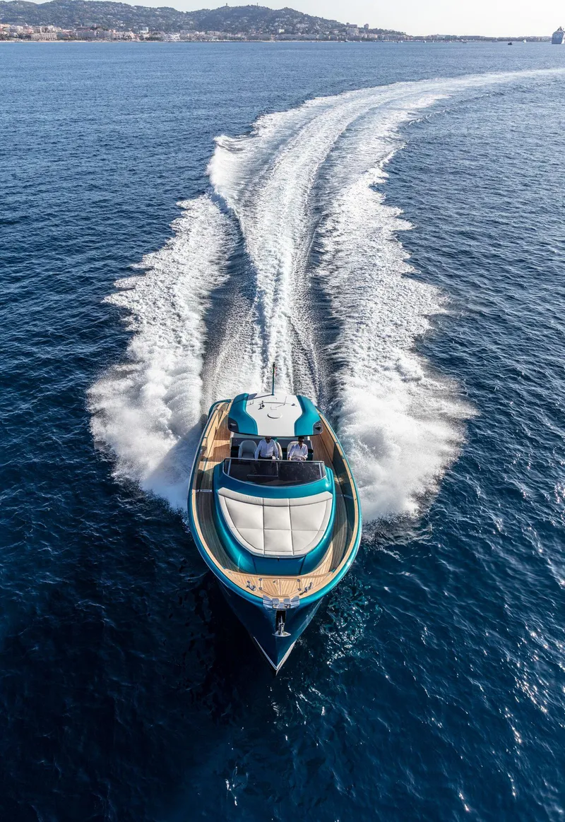 Slide: The Image of 2025 Solaris Power 48 OPEN yacht cruising on open sea. - 4