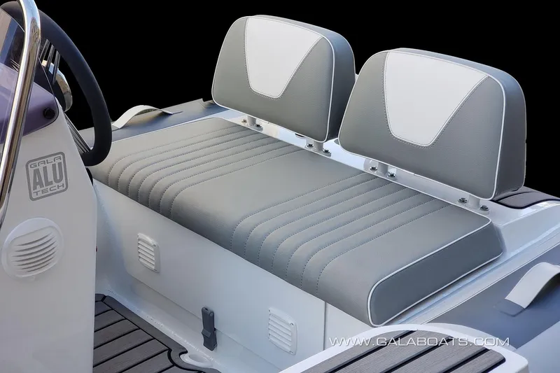 Slide: The Image of Gala V330 boat seating, 2023 model, featuring gray and white cushioned seats. - 3