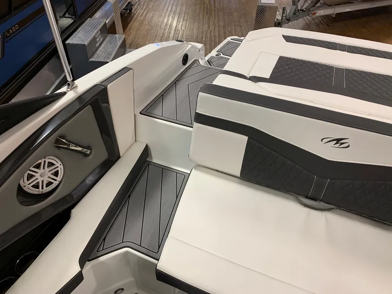 Slide: The Image of 2023 Monterey 218 Super Sport boat interior with sleek seating and modern design. - 5