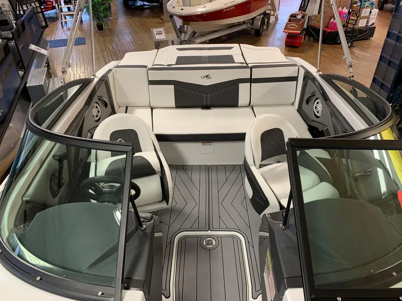 Slide: The Image of 2023 Monterey 218 Super Sport boat interior with sleek seating and modern design. - 6
