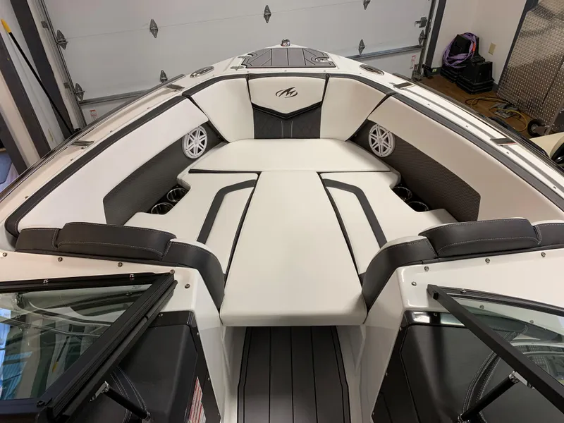 Slide: The Image of 2023 Monterey 218 Super Sport boat interior with sleek seating and modern design. - 8