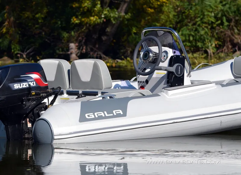 Slide: The Image of Inflatable Gala V360 boat, 2026 model, displayed indoors on a wheeled stand. - 4