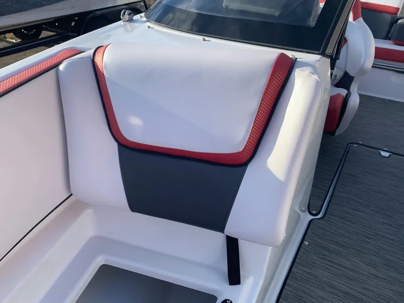 Slide: The Image of 2023 Scarab 195 ID boat interior with white, red, and gray upholstery. - 21