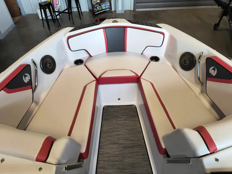Slide: The Image of Interior of 2023 Scarab 195 ID boat with red and white seating. - 23