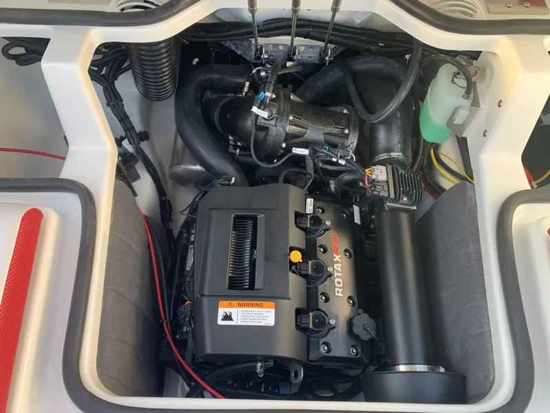 Slide: The Image of 2023 Scarab 195 ID engine compartment with Rotax engine. - 9